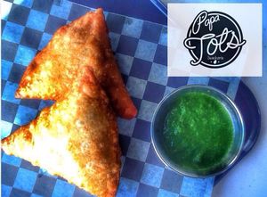 Our potato, pea and onion samosas with cilantro chutney. at Papa Tots in Puerto Escondido