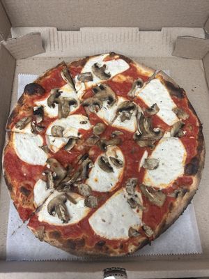 Small vegan cheese pizza with fresh mushrooms  at GG's Wood Fired Pizza in Milford