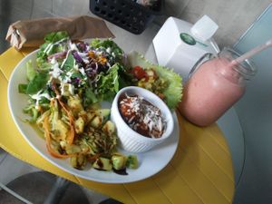 Prato do dia: Almondegas do chef ao sugo e queijo de castanha acompanhada de salada. Smothie rosa:  morango, maça, banana, limão e amendoa.  at Bigode Verde in Recife