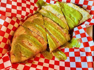 Quesadilla El pastor w/ avocado salsa drizzle. Delicious ✨  at El Cocinero Restaurant in Van Nuys