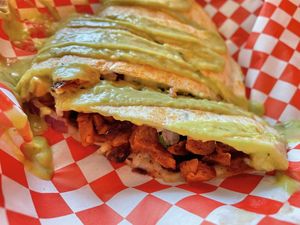 Quesadilla El pastor w/ avocado salsa drizzle. Delicious ✨  at El Cocinero Restaurant in Van Nuys