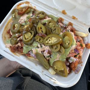 nacho fries with al pastor  at El Cocinero Restaurant in Van Nuys