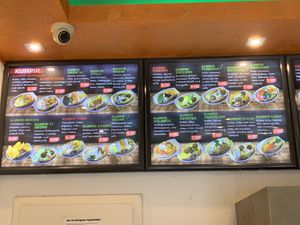menu in the store. this photo shows different options for kumpir (baked potato). vegan options are clearly markedd  at Avanti Kumpir & Falafel in Hamburg