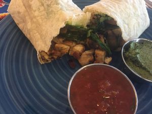 Breakfast burrito with tofu, potatoes, spinach, onion, avocado, pesto at Bentley's House of Coffee & Tea in Tucson
