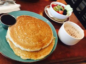 The vegan pancakes, season fruit bowl, and a hot chocolate!  at Bentley's House of Coffee & Tea in Tucson