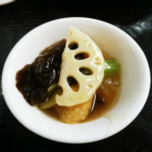Vegetables under tofu pufs.  at Su Shi Restaurant in Xiamen