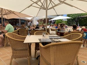Outside terrace next to beach at Mirablau Beach Bar & Restaurant in Mallorca