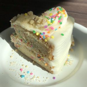 Birthday Cake Slice (no less delicious with some aesthetic damage on the road!) at Timeless Coffee Roasters and Bakery in Berkeley