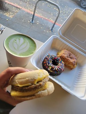 Soy Matcha, brekky Sammy, donut, and ham and cheese at Timeless Coffee Roasters and Bakery in Berkeley