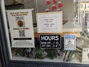 Window signs at Timeless Coffee Roasters and Bakery in Berkeley