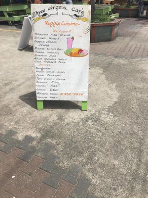 menu board outside at Three Angels Cafe - Maybe closed in Castries City
