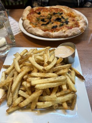 Vegan pizza and dill vinegar fries with vegan aioli. Super yummy!   at Deschutes Brewery & Public House in Bend