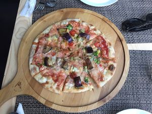 vegan pizza with cheeze sauce and aubergine  at The Vegvolution Kitchen in Hong Kong Island
