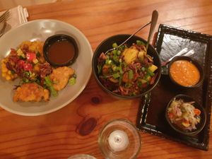 Begedel Jagung (Corn Fritters) $25.00, Kentang Mebasa (Roast potatoes) $12.00 at Warung Agus Balinese Cuisine in West Melbourne