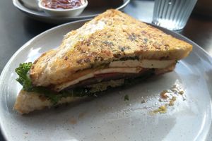 Garlic bread & pizza toastie w eggplant, fried tofu, potato cheese & marinara sauce! at Grown in West End