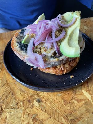 Avocado toast with hash brown   at Grown in West End
