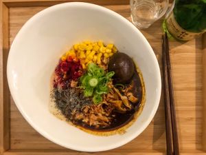 Black garlic ramen noodles at Men Impossible in Amsterdam