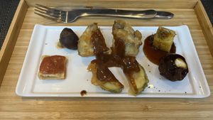 Warm starters (Eggplant Tempura, Zucchini Tempura, Abura-Age Chips, Tsukune, Imo Mochi & Takoyaki) at Men Impossible in Amsterdam