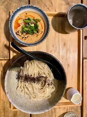 Dipping noodles with a creamy sauce at Men Impossible in Amsterdam