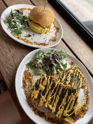 Left: Cheesus Burger, Right: Cheesy Veganmite Turmeric Toast at The Front Room Cafe in Hervey Bay