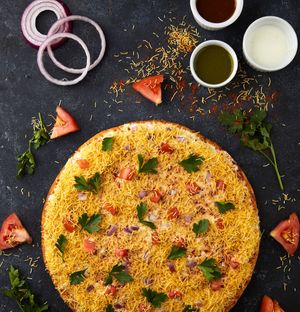 How about chaat on pizza? You will love it for sure.(Vegan Option) at Veggie Planet in Mississauga