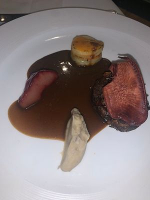 Roasted maitake mushrooms with red wine sauce and poached pear at Gauthier Soho in London