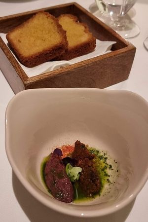 Rosemary marinated kalamata olive with toasts at Gauthier Soho in London