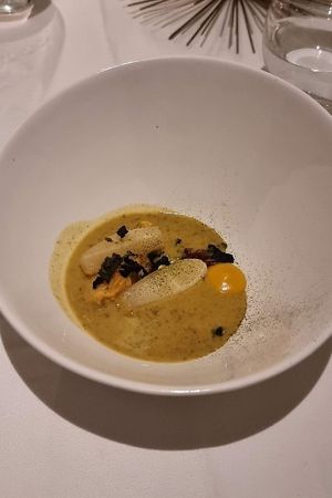 Golden turnips marseillaise, light saffron jus & garlic cream at Gauthier Soho in London