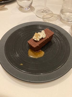 Chocolate and hazelnut Louise XV. We snaffled the chocolate truffles and mince pies which were served with coffee before I could take a photo of them… but also delicious.  at Gauthier Soho in London
