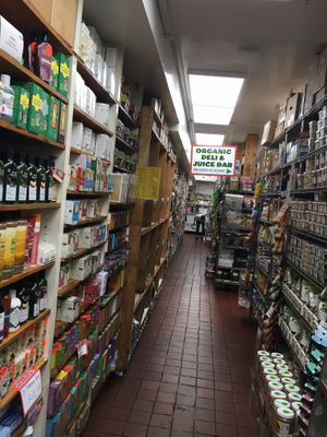 Cramped but full aisles of store at The Health Nuts Deli - East Side Midtown in New York City