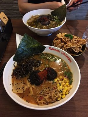 Dragon ramen and black truffle ramen in background at Ramen Ichiraku in Perth