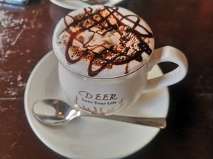 Homemade hot chocolate with almond milk at am/pm organic cafe in Pokhara