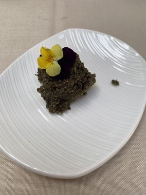 Greeting from the kitchen, Pumpkin seed at Gaudi&Naan in Ljubljana