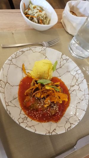 Lunch menu with mashed potatoes cabbage rolls in delicious tomato sauce at Gaudi&Naan in Ljubljana