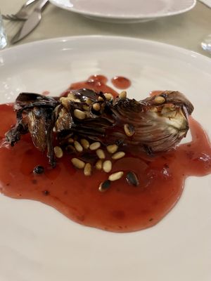 Chicory, kombucha reduction, pine nuts   at Gaudi&Naan in Ljubljana