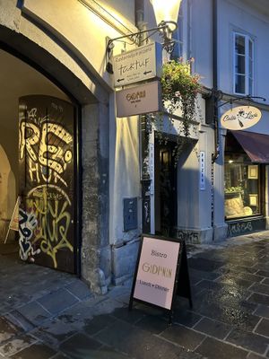 Look for the signs, because the restaurant is a little bit hidden in a yard.  at Gaudi&Naan in Ljubljana