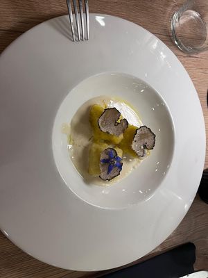 Homemade butternut squash gnocchi in a seriously good cheesy sauce and truffle at Gaudi&Naan in Ljubljana