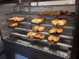 Pies in a warm display case.  at Tart Bakery - St Kevins Arcade in Auckland