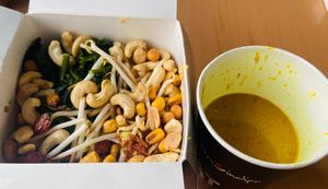 Gado Gado bowl with sauce in the side.  at my indigo - Museumstraße in Innsbruck