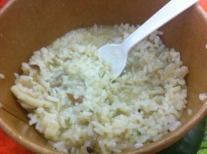 Green curry with rice in small take out container... good but REALLY REALLY SMALL :-( at ROM Vegetarian Restaurant in Da Nang