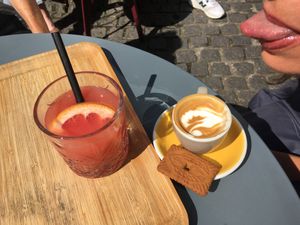 Grapefruit juice and Espresso Macchiato with oatmilk  at Take Five Espressobar in Ghent