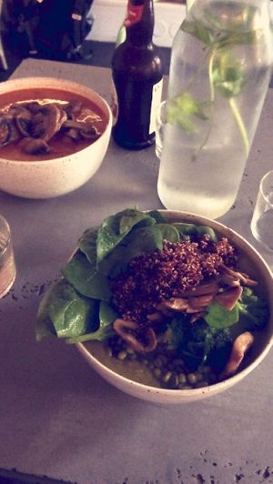 Green soup with toppings at Daily Pot in Bergen