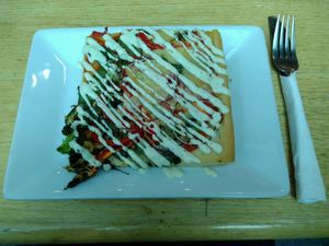 Pizza slice for $6 at Watson's Eatery in Dunedin