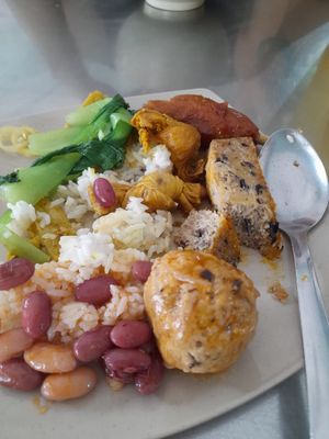 Rice with vegan ingredients picked from the cold trays at Giac Duc in Ho Chi Minh City