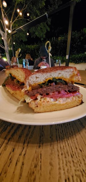 A second photo of Oliver's burger. at Oliver's in Santa Barbara