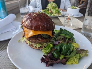 Hard to eat a burger like this, it's way too tall. No fries... at Oliver's in Santa Barbara