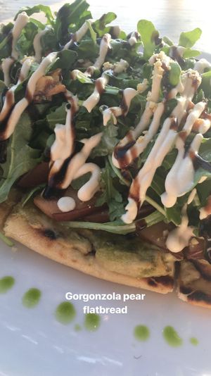 Pear arugula flat bread  at Oliver's in Santa Barbara