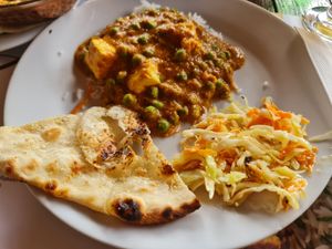 Mattar panner, rice pualuo, garlic naan, exotic salad at Diwali Mahal in Belgrade