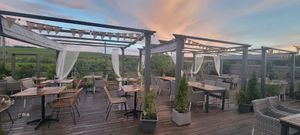 Unused outdoor dining due to rain at Weingut Trautwein - Restaurant & Hotel in Flonheim