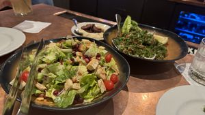 FATTOUSH SALAD •
lettuce, cucumbers, cherry tomatoes, red cabbage, lemon vinaigrette, pita crouton  at Figs in Jackson
